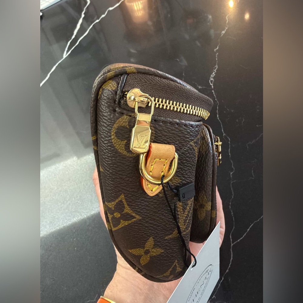 Louis Vuitton Mini Bumbag in Monogram Canvas Retails: $2160 - Picture 7 of 11